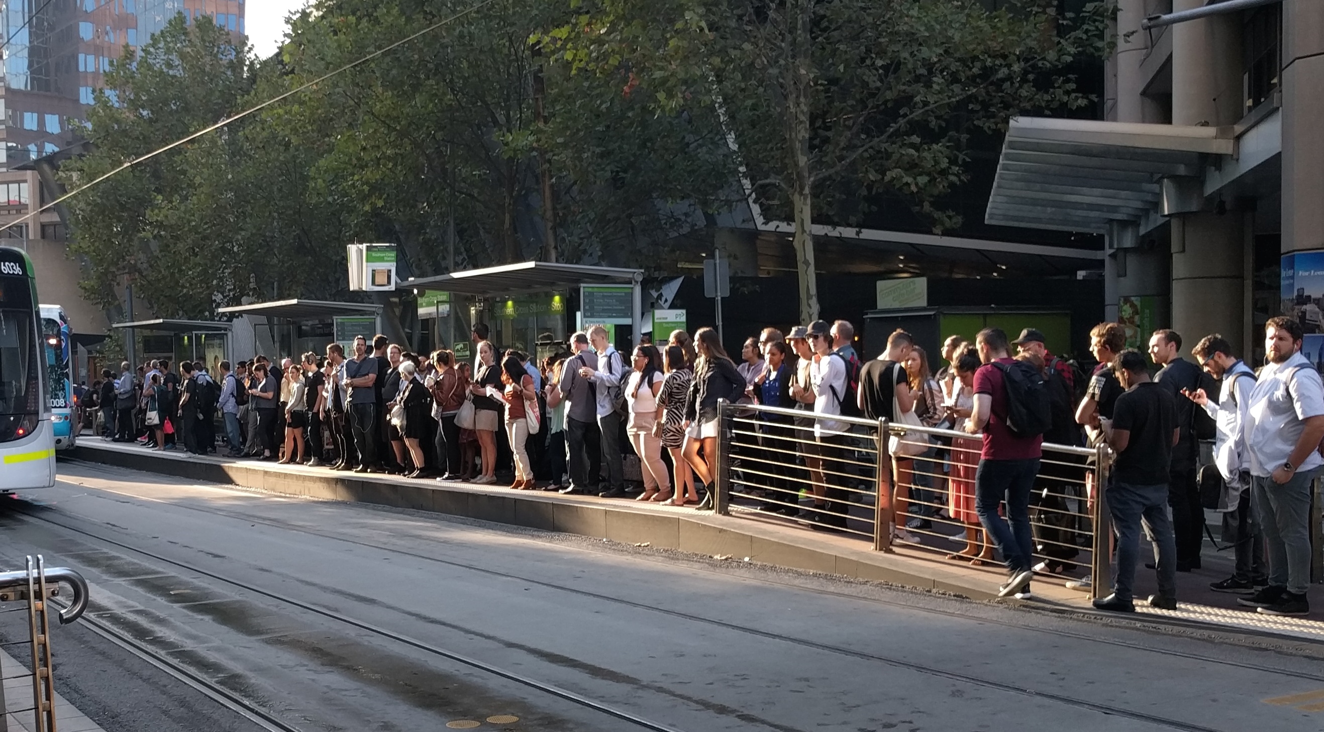 Crowded tram stop