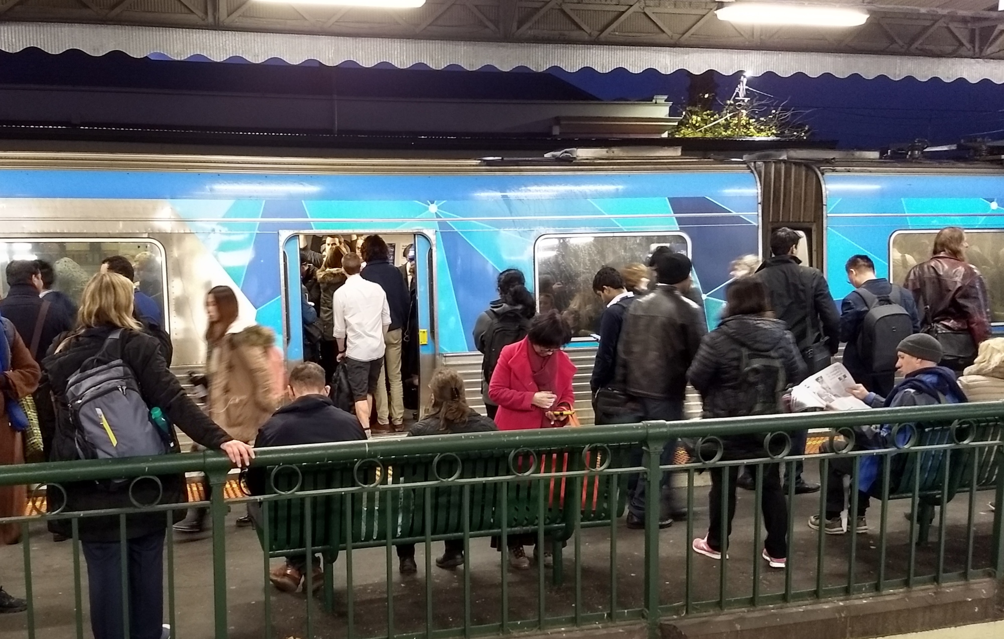 Crowded train and platform